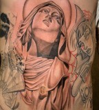 Virgin Mary Looking-Up Tattoo Designs and Art - Religious Tattoos