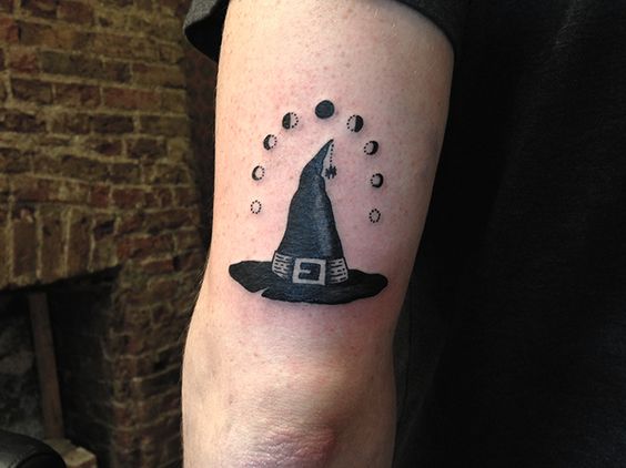 tiny witch hat tattoo