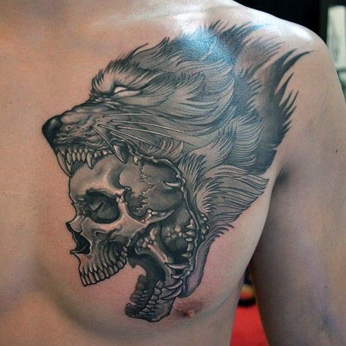 wolf and skull man tattoo