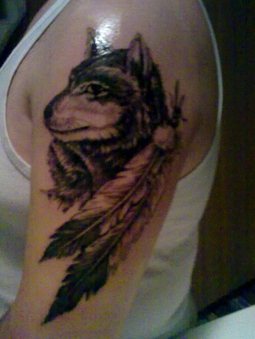 Beautiful Wolf Bicep Tattoo Designs