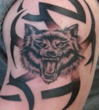 Tribal Wolf Tattoos On Bicep - Wolf Tattoo For Men Design