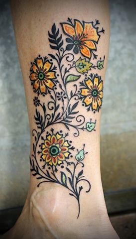 yeallowe and black flower tattoo
