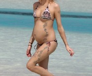 Beach girl tattoo