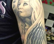 Black angels tattoos on arms