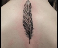 black feather tattoo