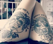 Flowers tattoos on leg