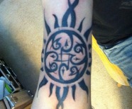 Suns tattoos on arms