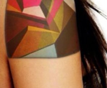 Black geometric shoulders tattoos