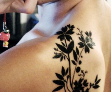 Black shoulder tattoos