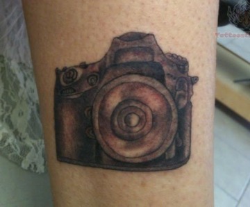 Cameras tattoos on legs