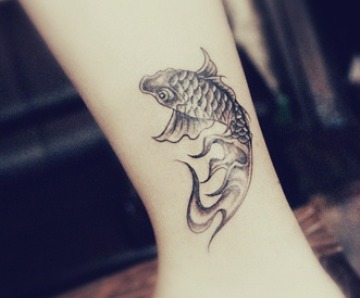 Fishes tattoos on legs