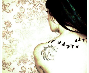 Flying Bird Silhouette Tattoo