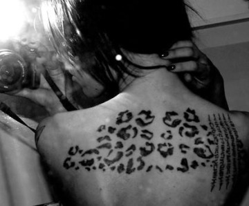 leopard and cheetah print tattoo
