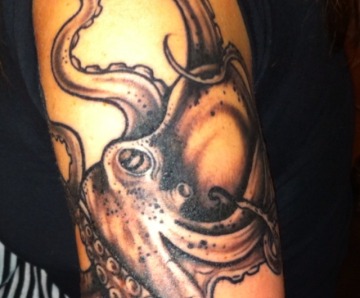 Octopus tattoos on legs