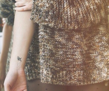 Origamis tattoos on arms
