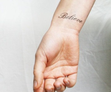 Tattoo with word believe