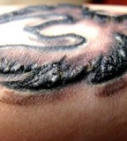 black-tattoo-front