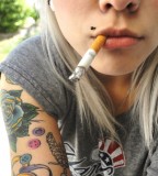 cigarette effi girl piercing tattoo 
