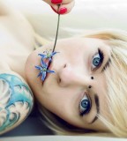 girl tattoo piercing