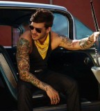 arm tattoo designs men in car