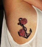 red small rose tattoo