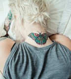 Butterfly-neck-tattoo