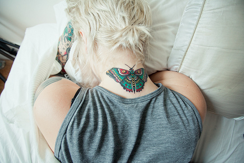 Butterfly-neck-tattoo