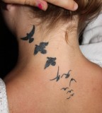 neck tattoos bird