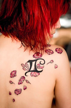 red hair girl tattoo clove pinks