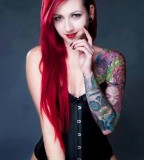 red hair girl tattoo girl in a corset