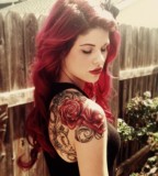 red hair girl tattoo red roses