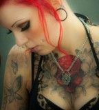 red hair girl tattoo sad girl