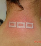 white ink tattoo symbols
