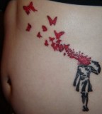 banksy graffiti tattoo girl shot herself