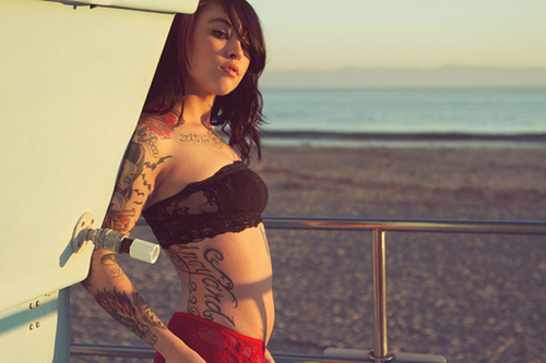 beach girl tattoo full lipped girl
