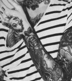 black and white photo smoking girl full sleeve tattoo