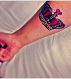 crown tattoo on hand red heart