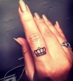 crown tattoo tiny finger tattoo