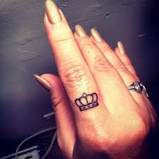 crown tattoo tiny finger tattoo