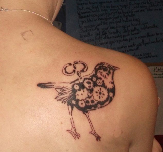 elegant bird tattoo clockwork bird