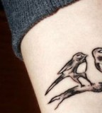 elegant bird tattoo small simple