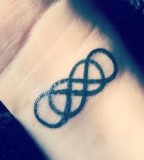 energy tattoo balance double infinity symbol