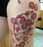 fan tattoo asian blossoms on thigh
