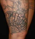 fan tattoo leg tattoo