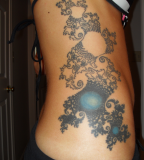 fractal tattoo black and blue fractal on ribs