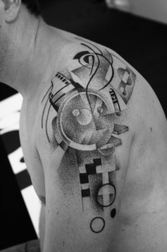 geometric abstract tattoo dotwork on shoulder