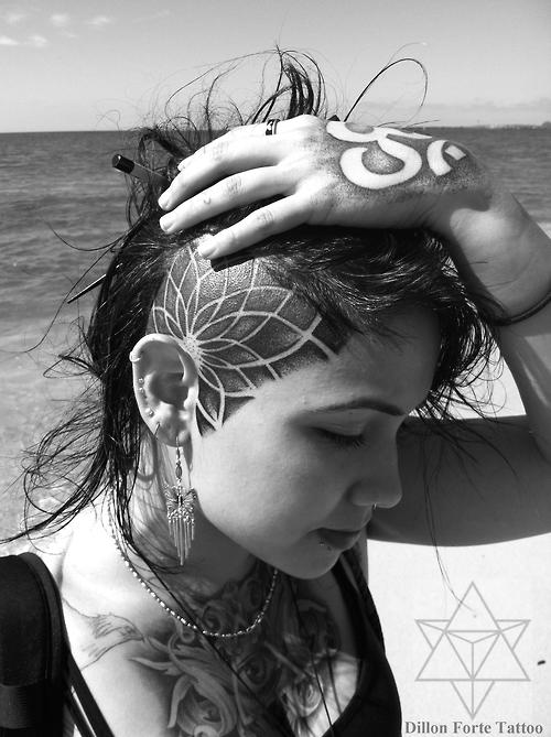 geometric abstract tattoo flower on head