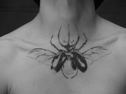insect-tattoo-bug-on-chest
