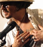 johnny depp tattoo lilly rose on chest