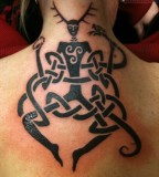 pagan tattoo on back neck